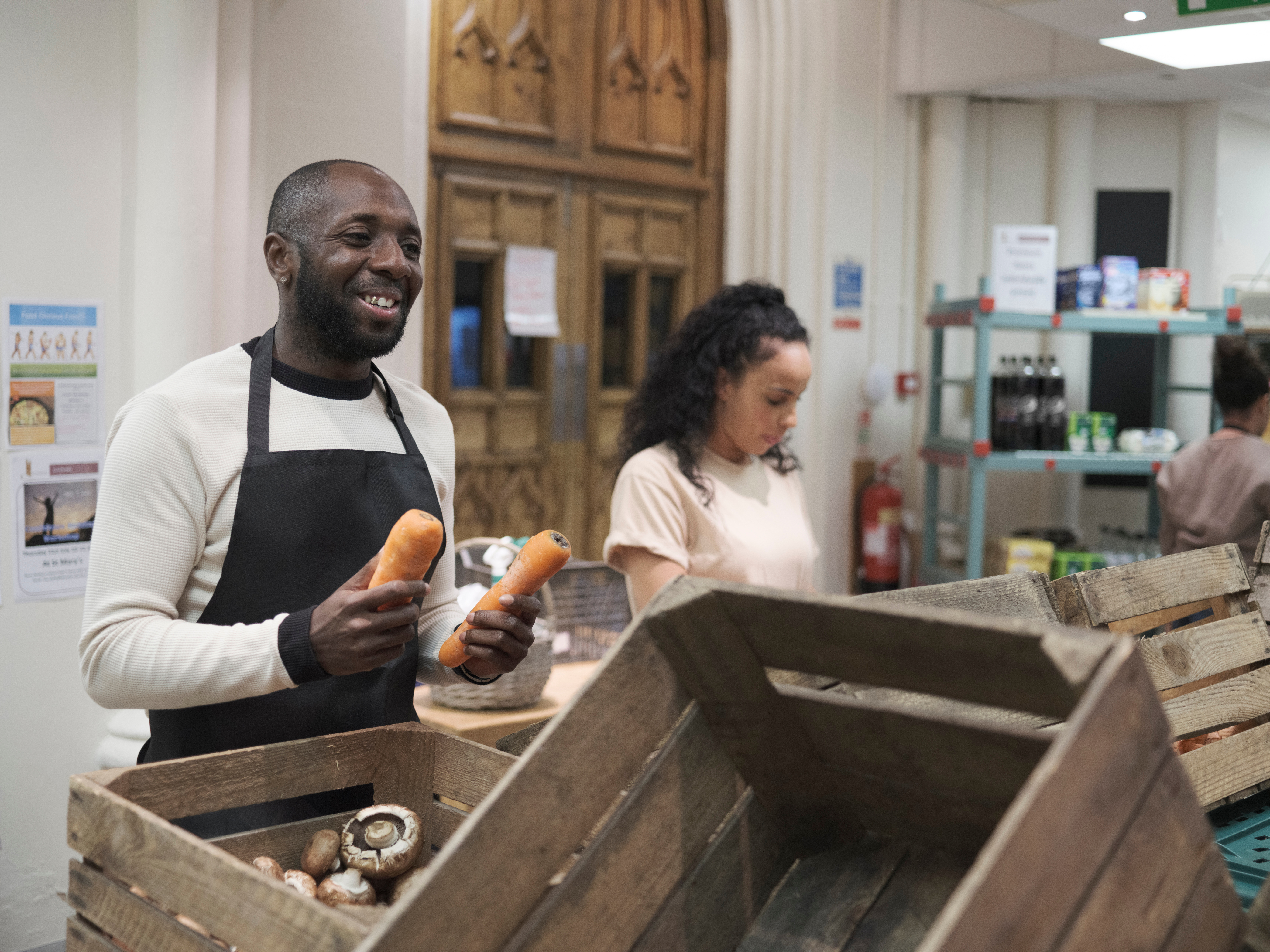 Volunteers working in community food center