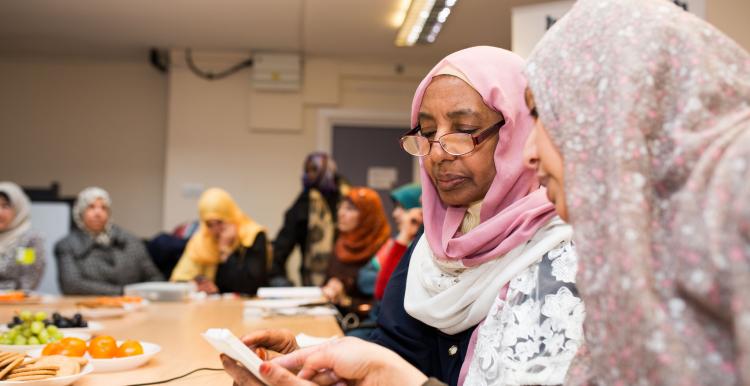 Women looking at a phone