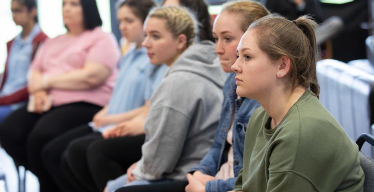 Young people listening in a group 