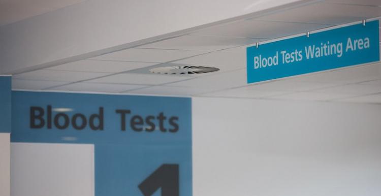 A sign saying Blood Test in a hospital