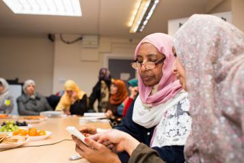 Women looking at a phone