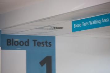 A sign saying Blood Test in a hospital