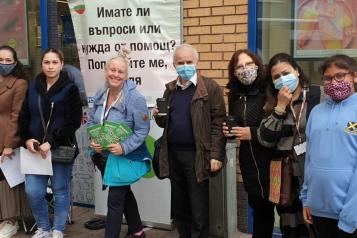 Sue-Jane and members of the community standing on the street