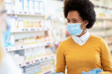 Photo of pharmacist wearing a mask