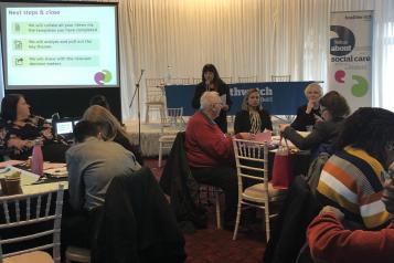 Healthwatch board member at a conference