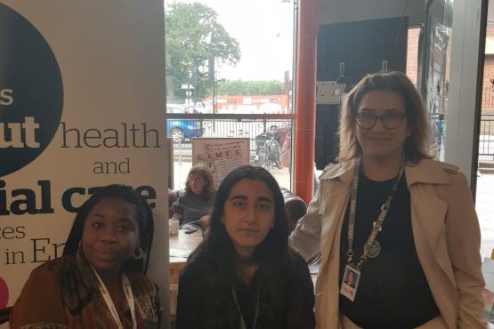 Healthwatch staff behind stall Healthwatch staff behind stall